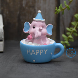 Baby Elephant Sitting in Mug Showpiece