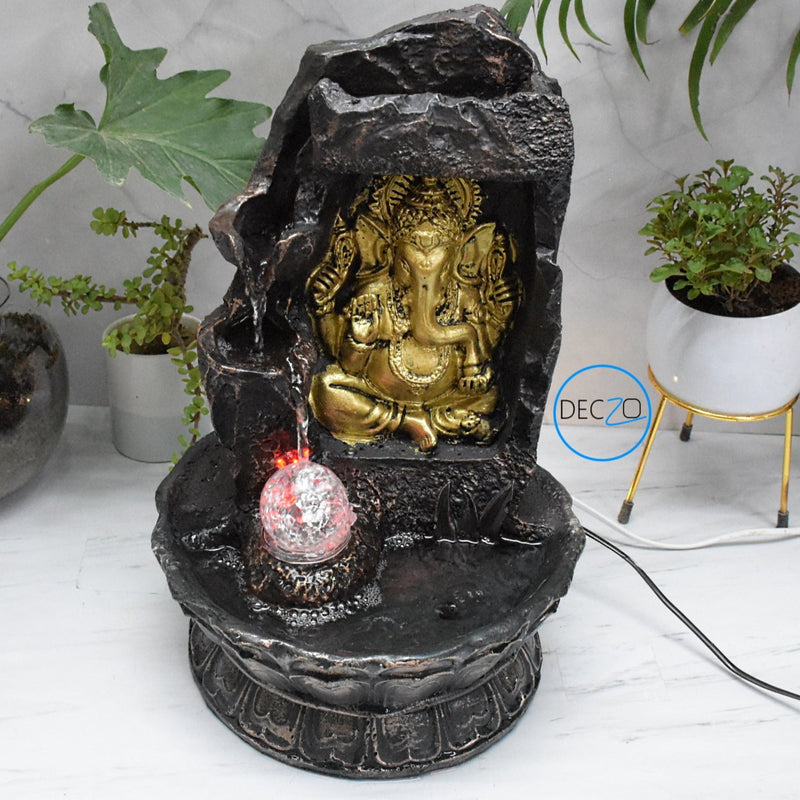 Lord Ganesha Sitting Under Stone Cave Water Fountain  : 39 CM