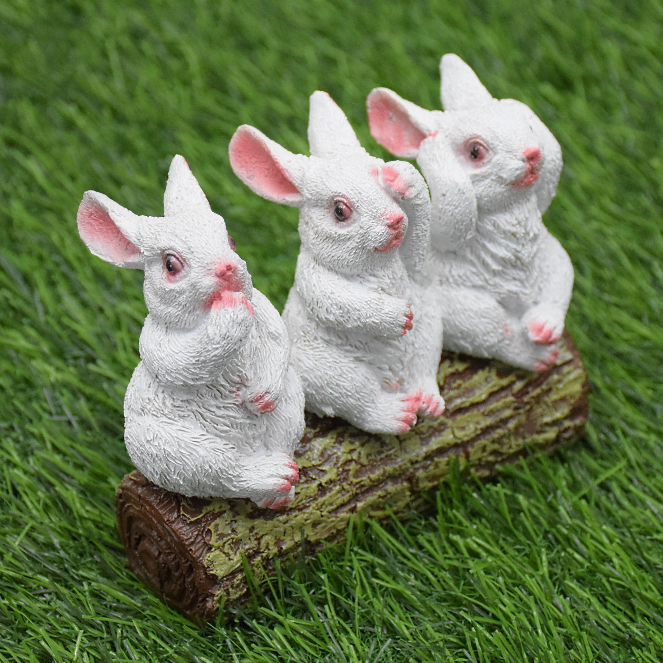 Rabbits Sitting on Tree Trunk Showpiece : White