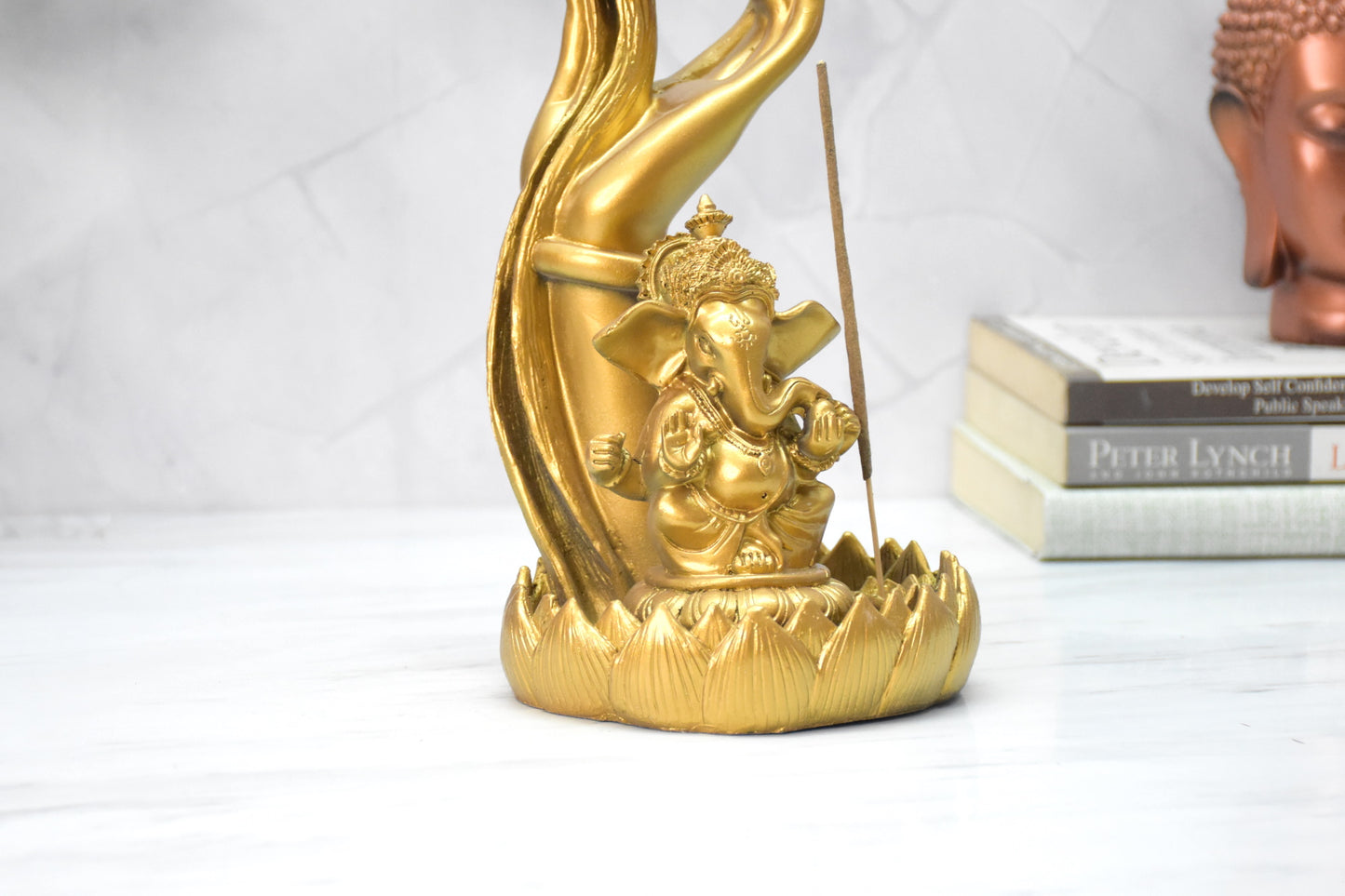 Ganesha Sitting Under Hand Incense Holder