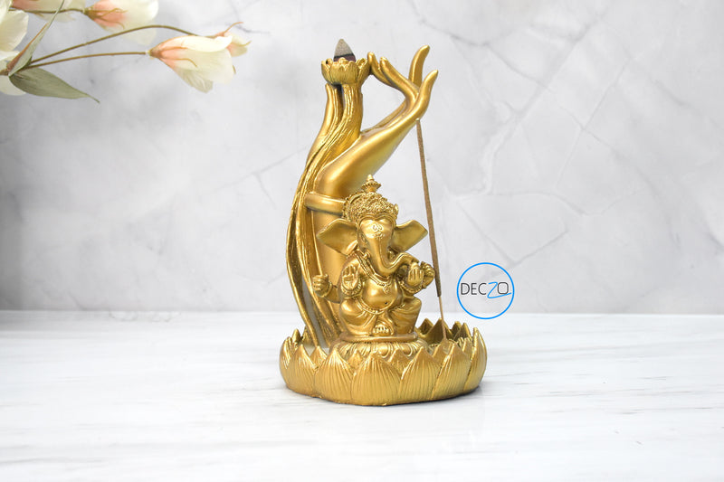 Ganesha Sitting Under Hand Incense Holder